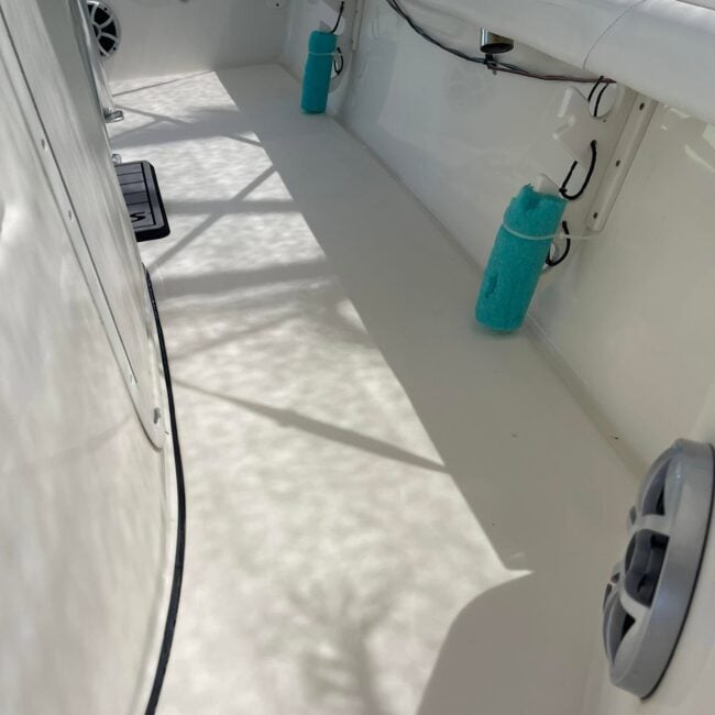 Clean bright white boat cockpit deck after deck cleaning and marine detailing in Southwest Florida